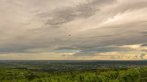 Sun setting over rural zone. Rain clouds moving Stock Footage 133315579