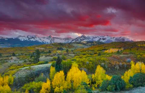 Sun setting over San Juan Mountain range Autumn Fall color of Dallas Divide Stock Photos