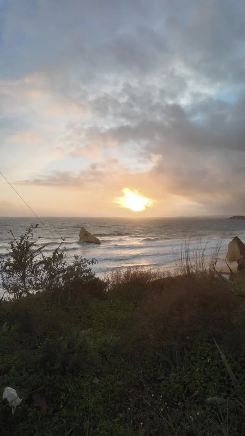 Sun Setting Over the Sea in the Algarve, Portugal Stock Footage 301646817