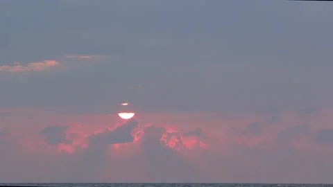 Sun setting over the south pacific ocean telephoto shot. Video stock 144943280