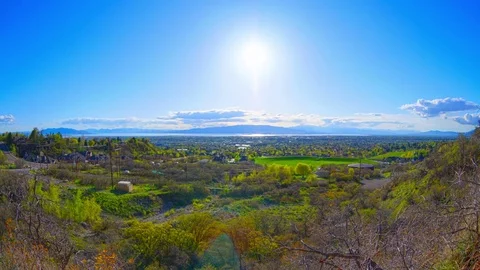 Sun setting over vast bright valley Stock Footage 74096305