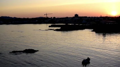 Sun setting over water horizon at cabo de palos seascape Video stock 130881915