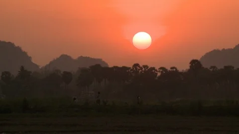 Sun Setting As People Walk By Stock Footage 112651009