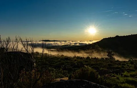 Sun setting Stock Photos