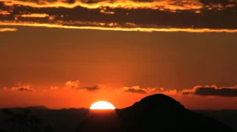 Sun setting on red horizon Stock Footage 11347574