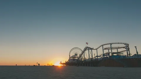 Sun setting at the Santa Monica Pier in Southern California Stock Footage 100861205