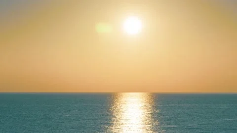 Sun setting in the sea at sunset in a summer evening . 4K time-lapse Stock Footage 152933042