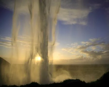 Sun setting at seljalandfoss Stock Photos