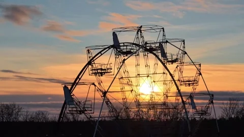 Sun Setting Through Apocalyptic Panorama Wheel Stock Footage 330605496