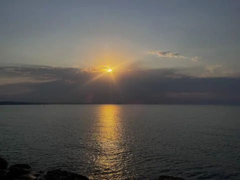 Sun setting through Stock Photos