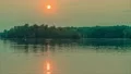 Sun Setting Through Smoky Haze - 4K Time Lapse 4k or 4k+ Resolution