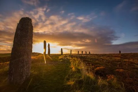 Sun Setting Through the Stones at the Ring of Brodgar in Orkney Stock Photos