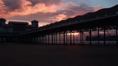 Sun Setting Under Pier Time-lapse 4K Video stock 154522634