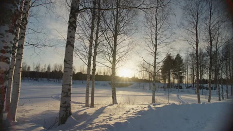 Sun settings down on Lapland, Finland winter time Stock Footage 325648729