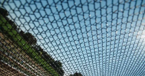 Sun shade cloth at farm for blocking rays on crops Stock Footage 120618232