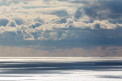 The Sun Shimmering on the Ocean Stock Photos