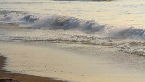 Sun shine sand water waves to shore ground Stock Footage 98290320