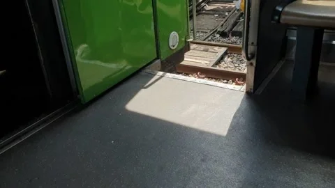 Sun shine at the stairway of a train Stock Footage 164547367