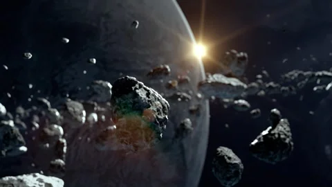 The sun shines on the asteroid belt in space. Vidéo 333101158