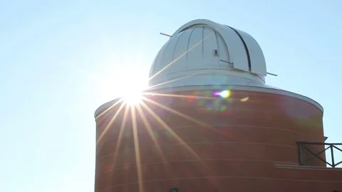 Sun shines behind the dome of the astronomical observatory of Parco Antola in Stock Footage 81613142