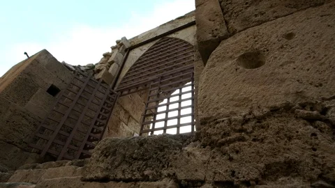 Sun shines behind a window of Sidon Sea Castle in Sidon, Lebanon Stock Footage 119115690