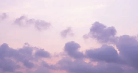 The sun shines brightly, the clouds move through the purple sky. Stock Footage 187484849