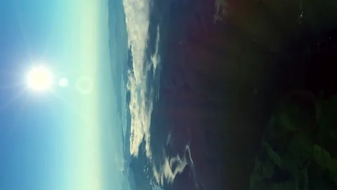 The sun shines on the earth below Stock Footage 158782482