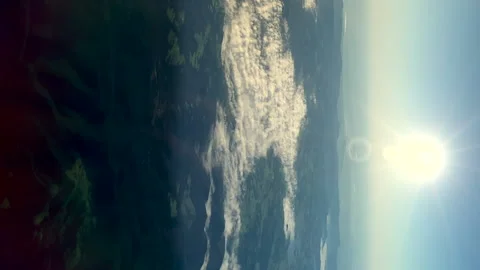 The sun shines on the earth below Stock Footage 158782752