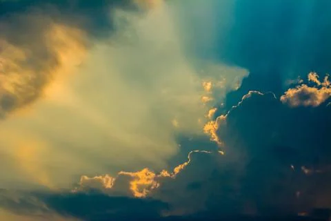 Sun shines through the clouds and the sky shines in beautiful light Foto stock