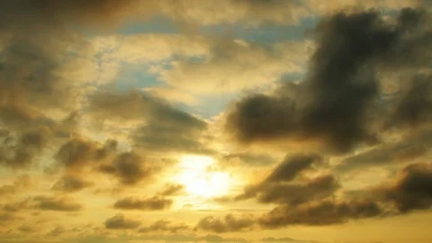 The sun shines through the clouds at dawn. Stock Footage 341317038