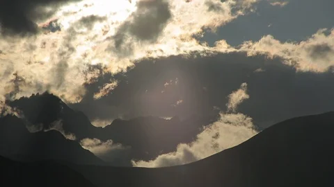 Sun Shines Through Clouds mountains landscape Stock-Footage 87751884