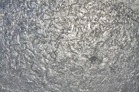 Sun shines through the ice pattern Stock Photos
