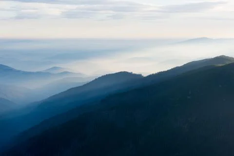 The sun shines through the mountains, Low Tatras, Chopok, central Slovakia Stock Photos