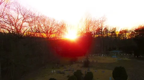 Sun Shines through Trees on Cemetery Stock-Footage 47335830