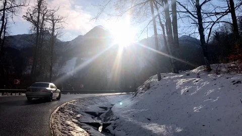 The sun shines through the trees winter snow forest Stock Footage 121991337