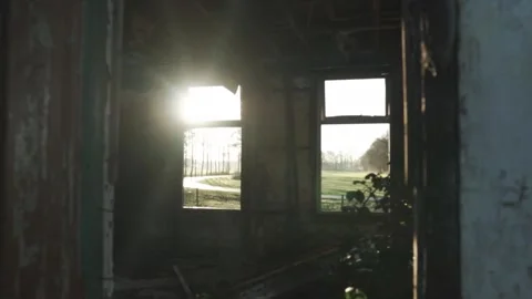 Sun shines through windows of abandoned building Stock Footage 289663452