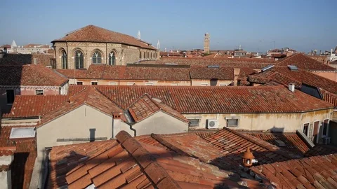 Sun shines on the tile ,rooftops of Venice, Italy. Stock Footage 70338124