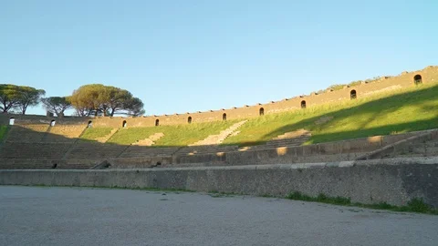 Sun shining on the ampitheatre in Pompeii Italy Stock Footage 88004262