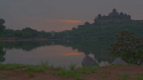 Sun shining and reflection from the lakeside of the fort Stock Footage 221114922