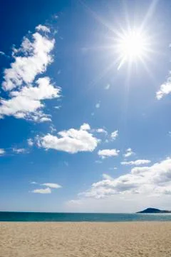 Sun shining on the beach Stock Photos