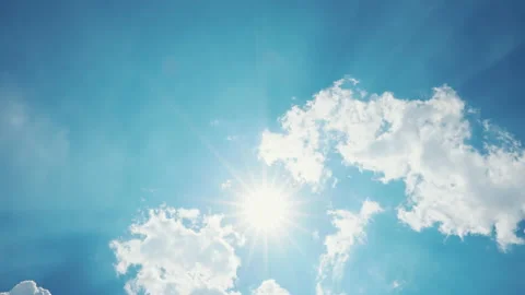 Sun shining in blue sky with clouds movement in the day Stock Footage 155215908
