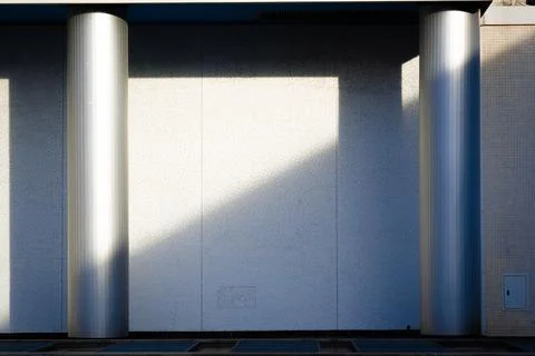 Sun shining on building wall Fotos de archivo
