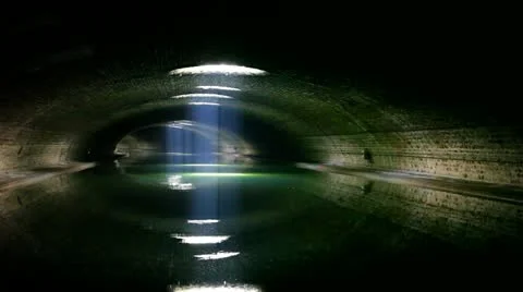 Sun shining down in tunnel Stock Footage 10867589