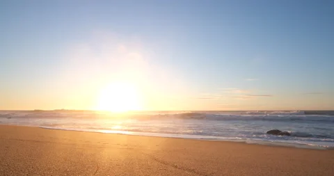 Sun shining on horizon on beach at sunset. Stock Footage 146674115