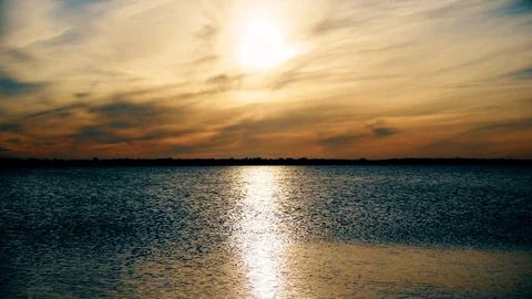 Sun shining on lake or river forming a sun way on water Stock Footage 71168252