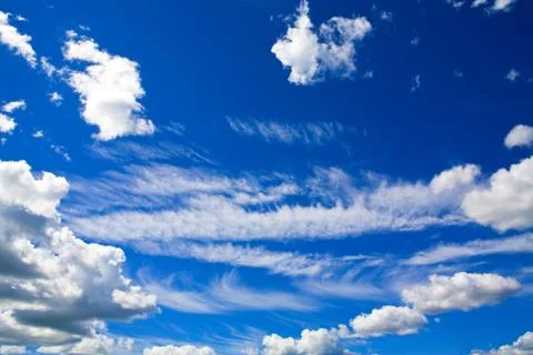 Sun shining over cloudscape Stock Photos