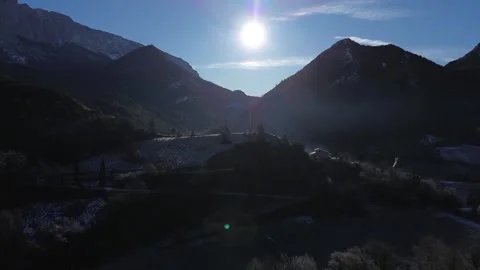 The sun is shining over a mountain range Stock Footage 328615464