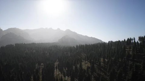 The sun is shining over a mountain range Stock Illustration