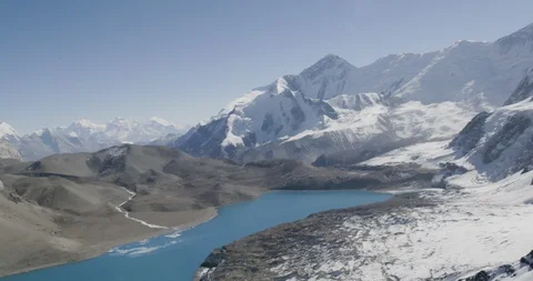 Sun shining over the snow covered Annapurna ranges in Himalayas Stock Footage 145271878