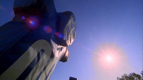 Sun shining over the tackling dummy at the NFL stadium Stock Footage 113275251